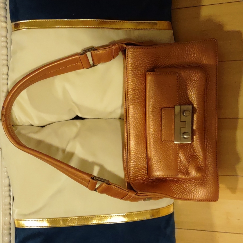 Rose gold hand bag